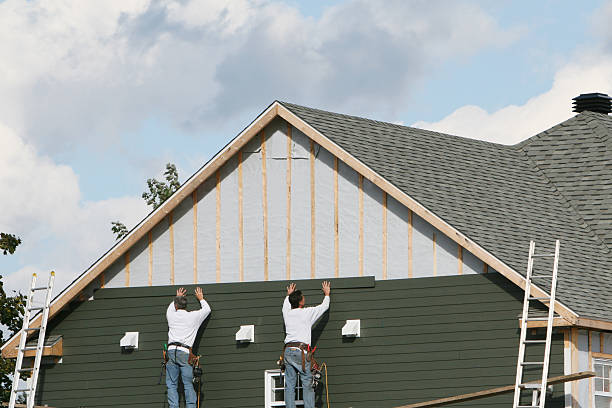 Professional Emergency Siding Repair technician working in Shadyside, OH